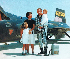 Joe Engle is greeted on the lakebed by his wife Mary, and two children, daughter Laurie and son Joe after the first of his three astronaut qualification flights. This was the sixth such astronaut flight in the X-15 program. 